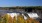 Waterfall in fall foliage on a cloudless day